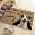 Custom doormat with smiling dog, text "Visitors must be approved by Charlie", paw prints; housewarming gift